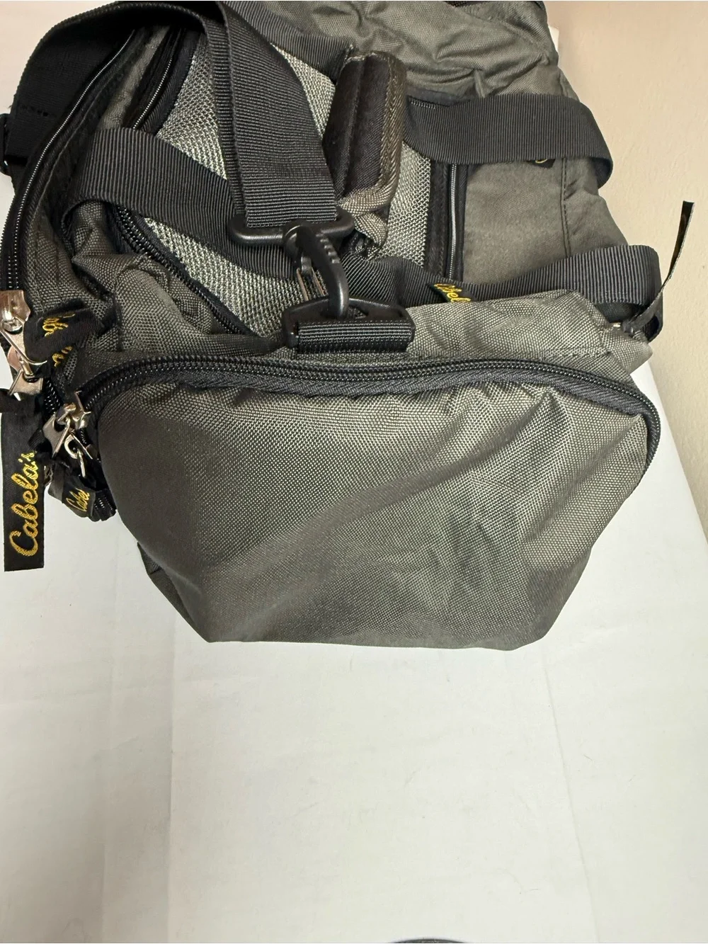 Cabela's Olive Green and Black Duffel Bag with Yellow Logo
